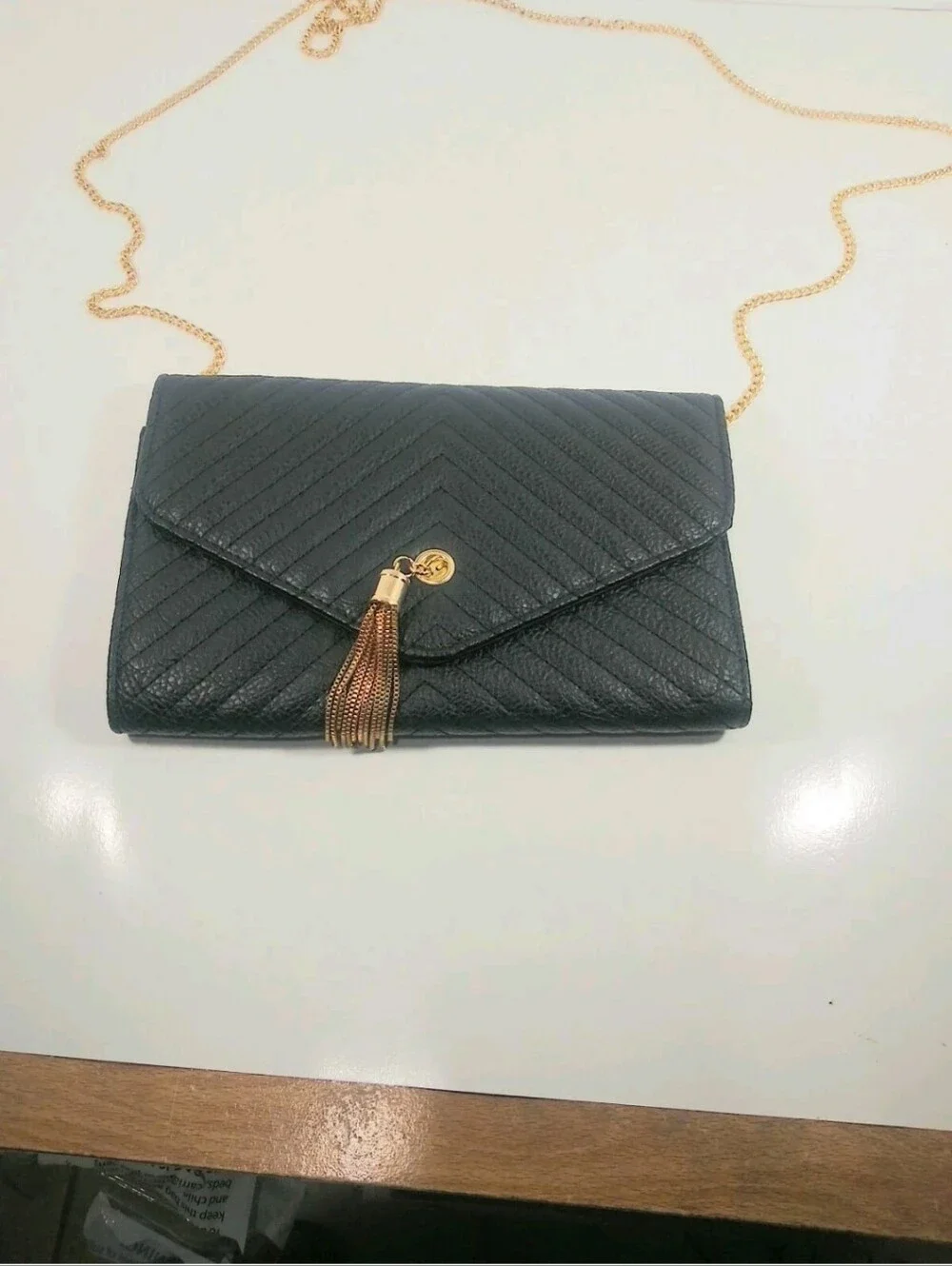Black Quilted Envelope Crossbody Bag with Gold Chain and Tassel 8 x 11
